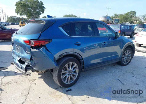 2021 Mazda Cx-5 Grand Touring z USA, uszkodzony, nr VIN JM3KFADM7M1342367